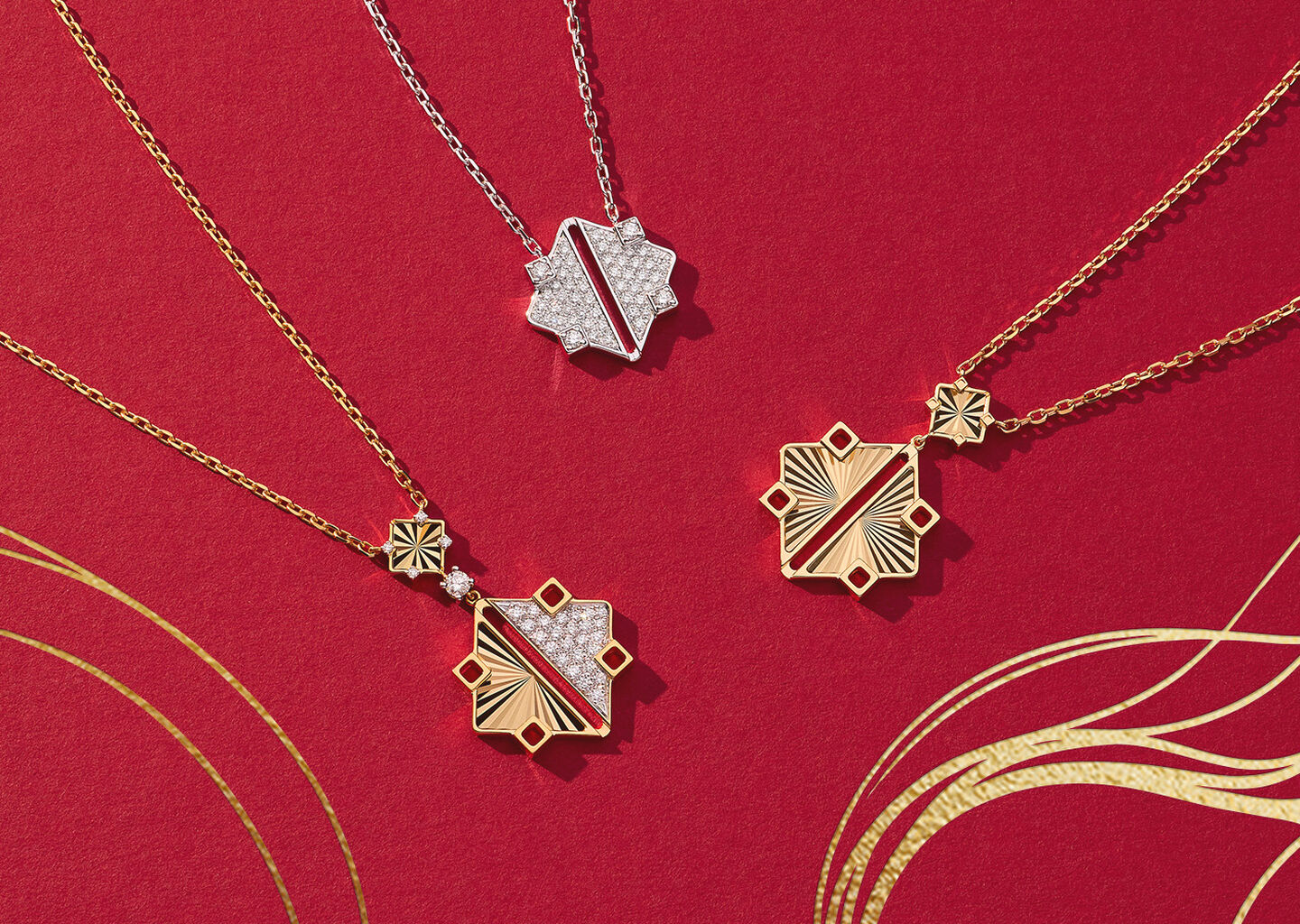 Three Birks Muse necklaces on a red background,